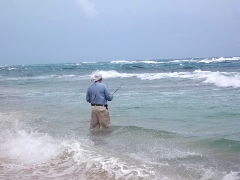 Casa Canada Big Corn Island fly fishing on sea shore.